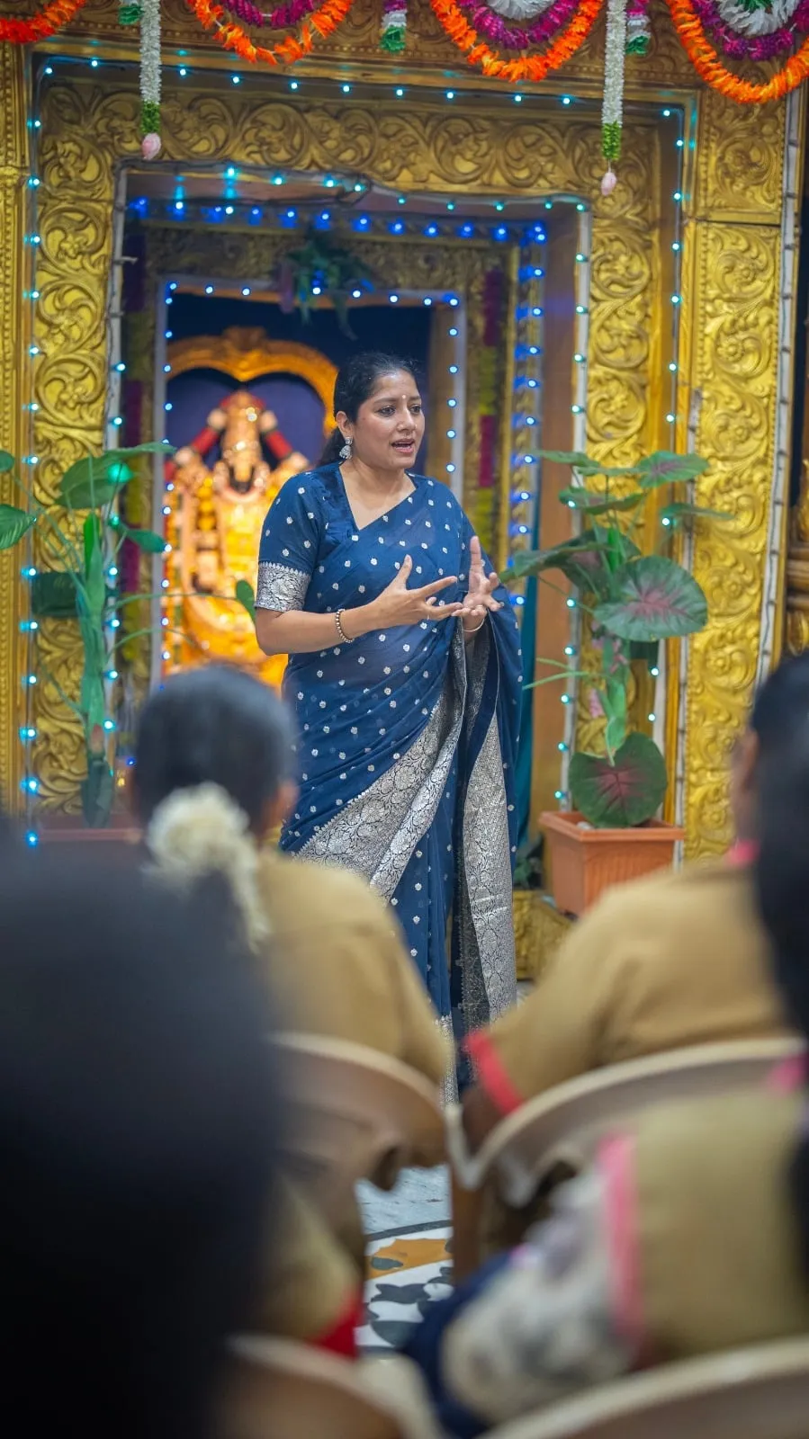 Anumol speaks to the gathering about independence, equality and mutual support.