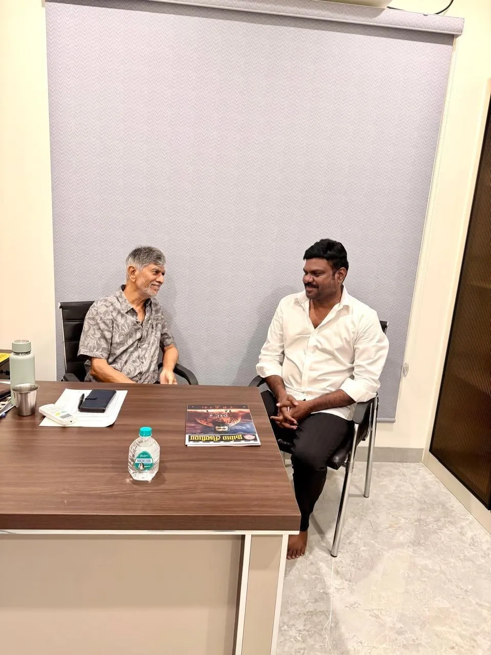 GKM Tamil Kumaran and S.A. Chandrasekhar discuss the council's activities during the courtesy visit.