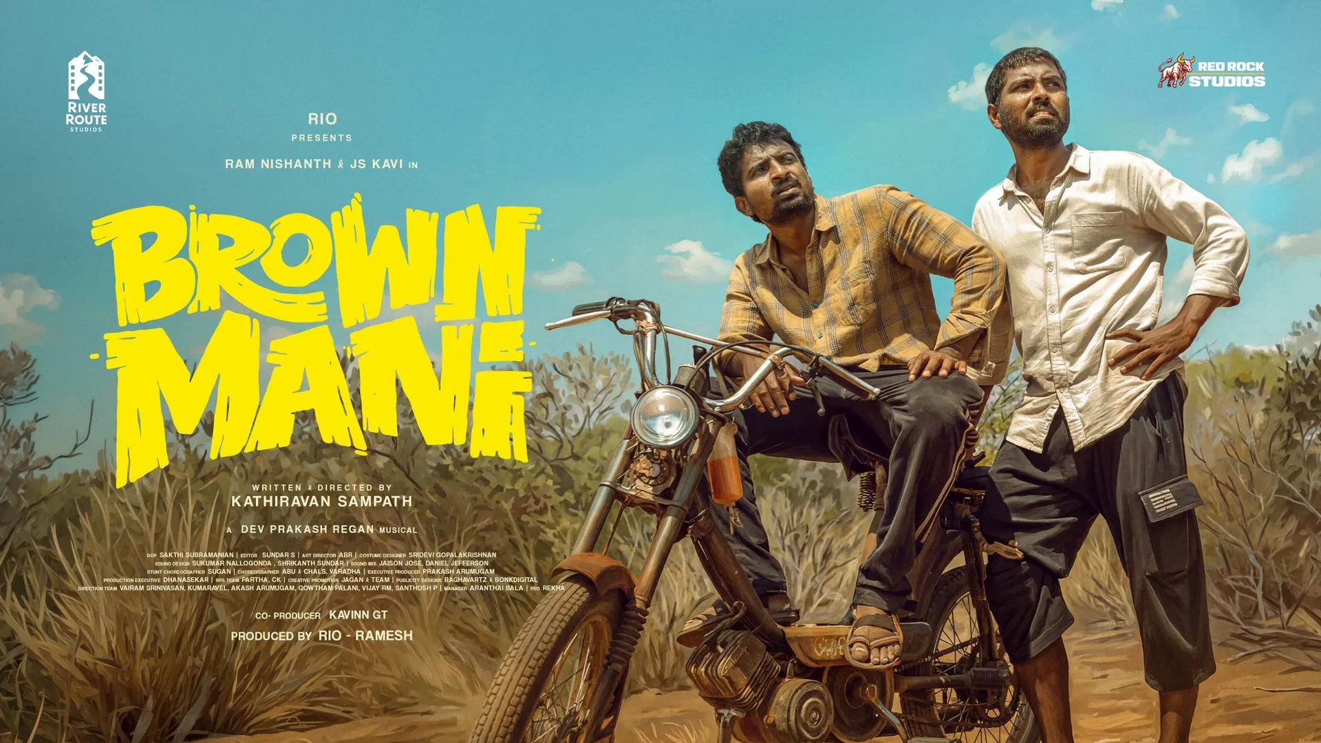 Brown Mani first look poster with Ram Nishanth and JS Kavi beside an old motorbike on a rural road