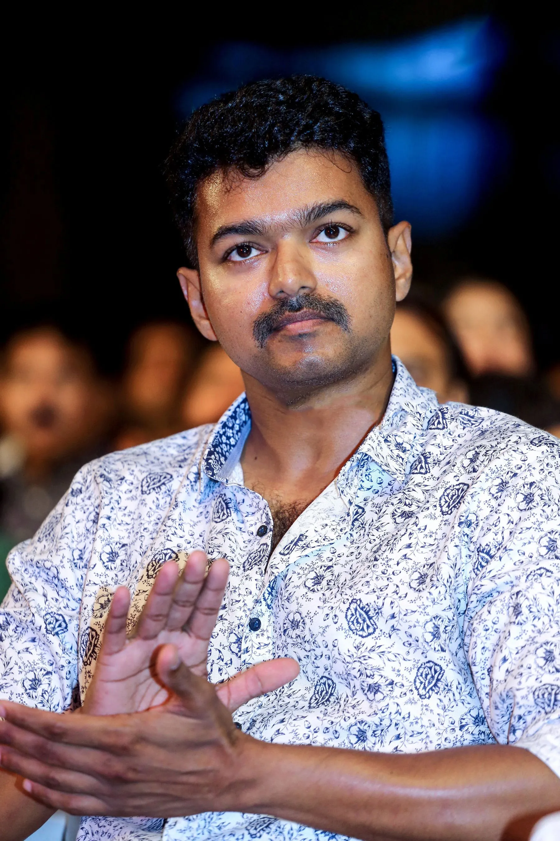 Vijay applauding at a film event, the actor whose final film as a lead was leaked online while pending censor review