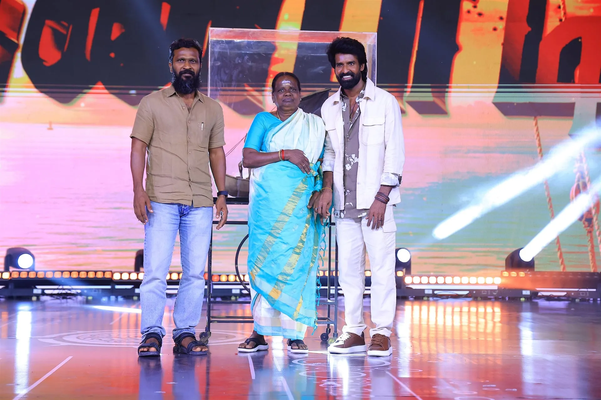 Vetrimaaran and Soori onstage at the Mandaadi audio launch