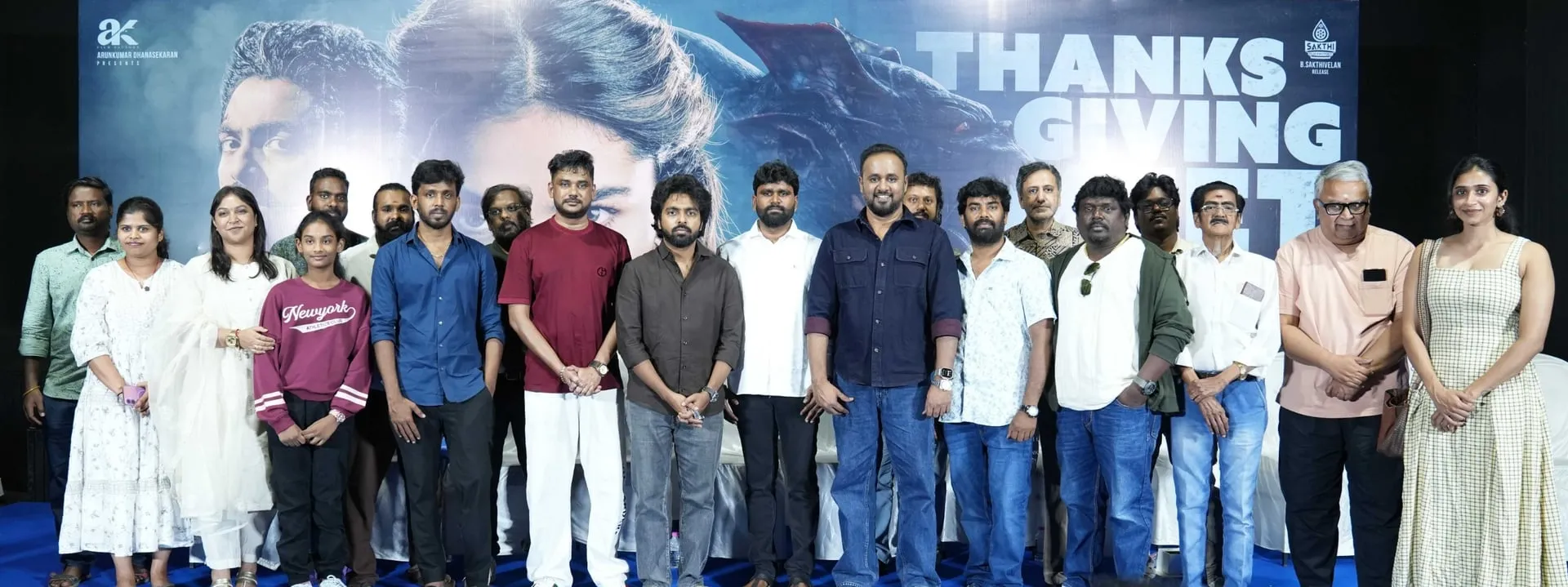 The Immortal cast and crew lined up onstage for the film's success celebration