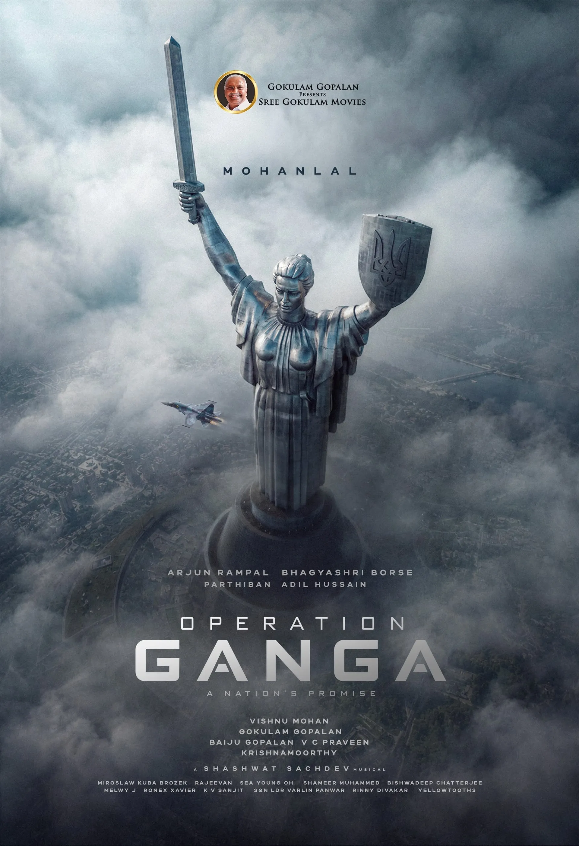 Operation Ganga title poster: Kyiv's Motherland Monument rises through cloud with a fighter jet passing, Mohanlal's name above and the cast listed below