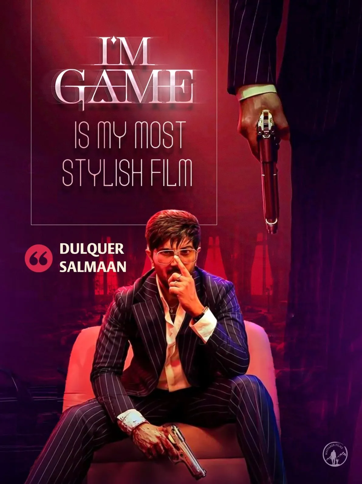 I Am Game promotional card with Dulquer Salmaan in a pinstriped suit holding a pistol, beside the line 'I'm Game is my most stylish film'