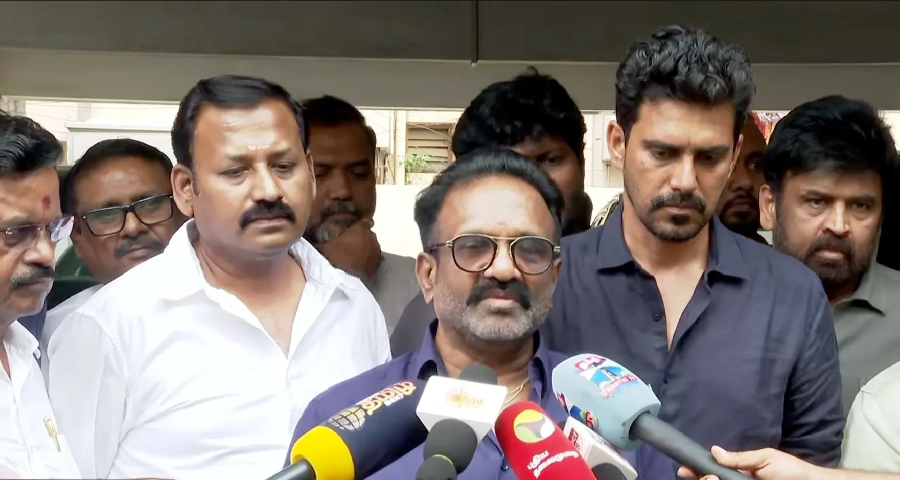Producers Shiva, Kalaipuli S. Thanu and Dream Warrior Pictures' S.R. Prabhu address the press outside Qube Cinema Technologies' office in Chennai after Karuppu screens up north without authorisation.