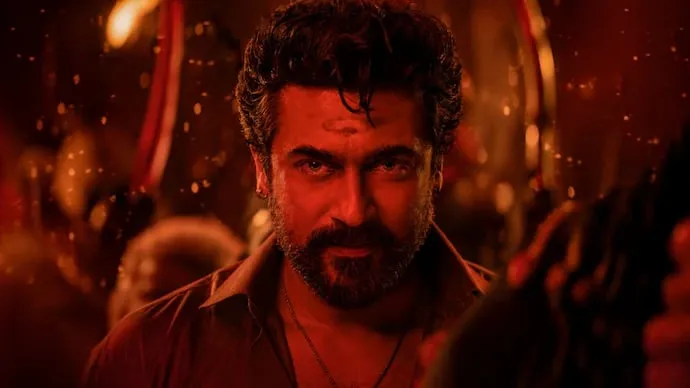 Suriya in the title role of Karuppu, shot in temple-fire reds, the look RJ Balaji built the film around