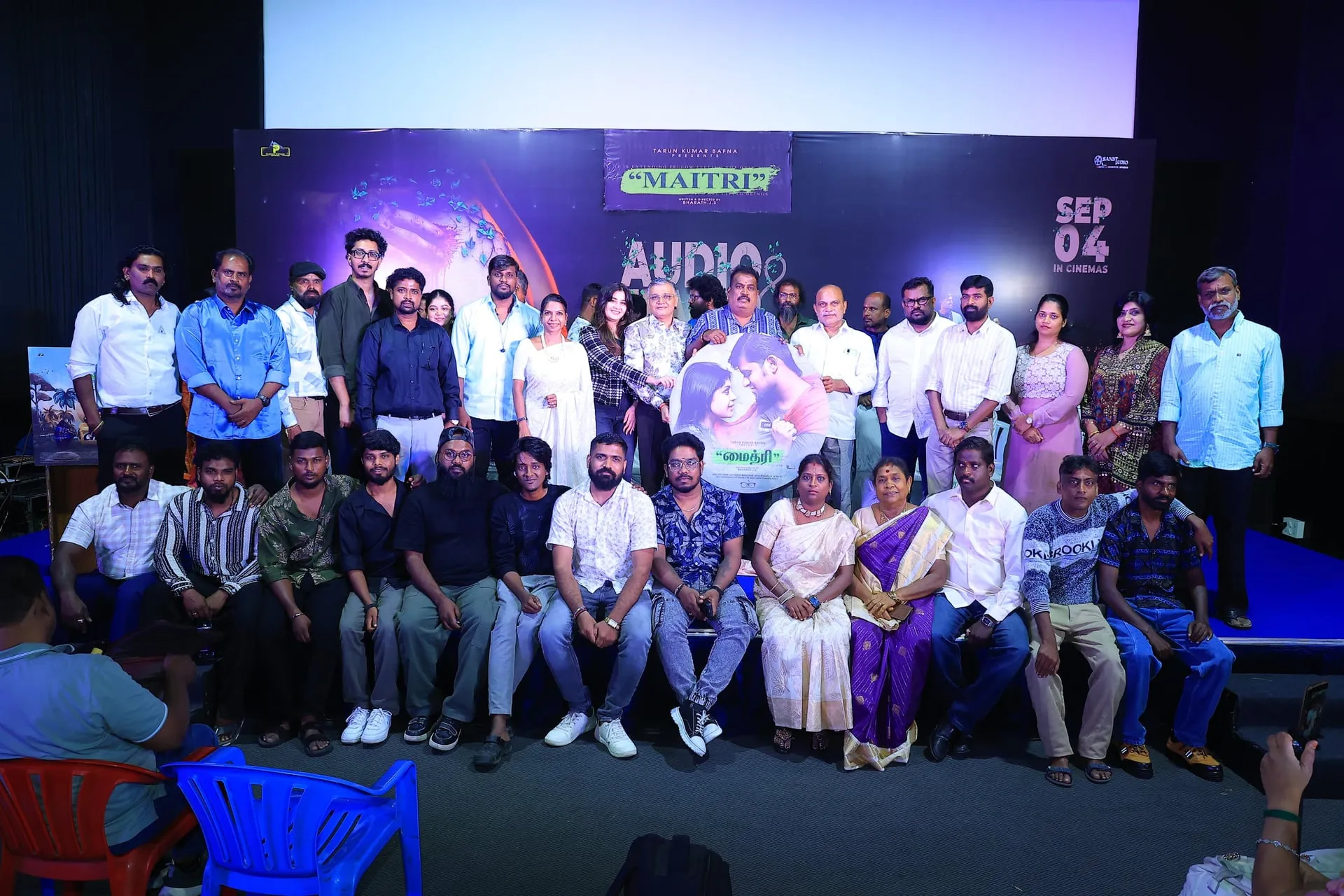 The Maithri cast and crew onstage with the film's first-copy disc at the songs launch