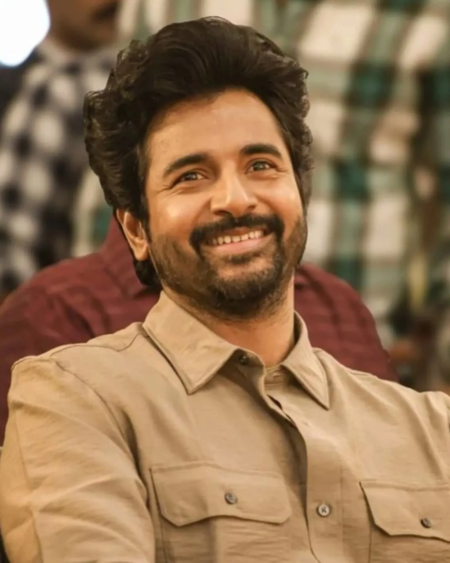 Sivakarthikeyan smiling at the Madharaasi Kerala promotional event