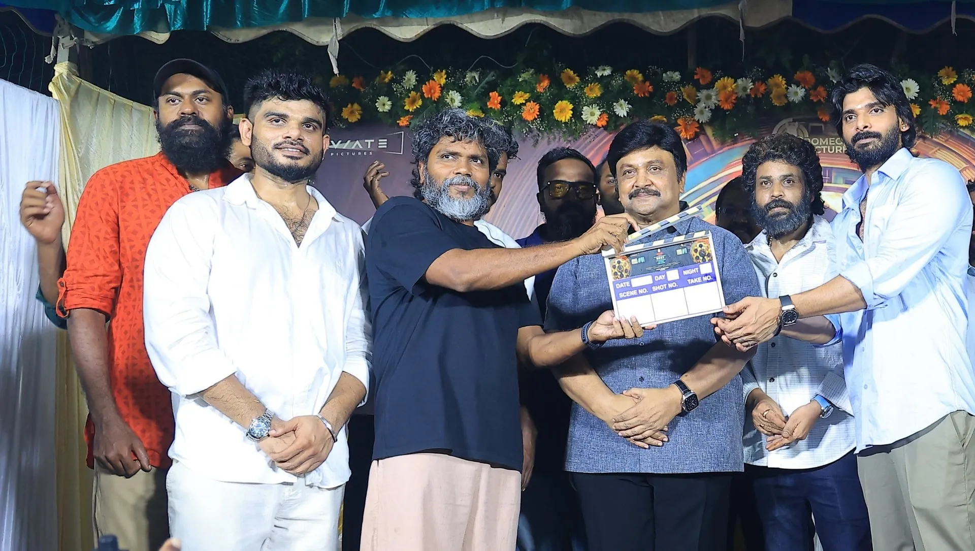 Prabhu holds the ceremonial clapboard as the shot is called at the launch of Franklin Jacob's new film