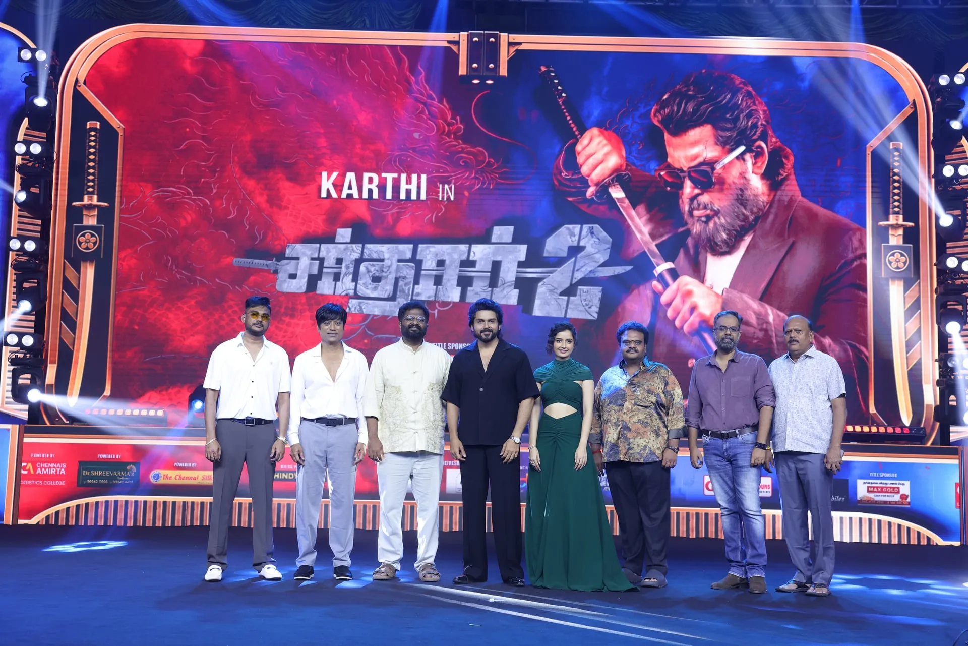 Karthi, S.J. Suryah, Ashika Ranganath and P.S. Mithran with the Sardar 2 team onstage at the audio and trailer launch