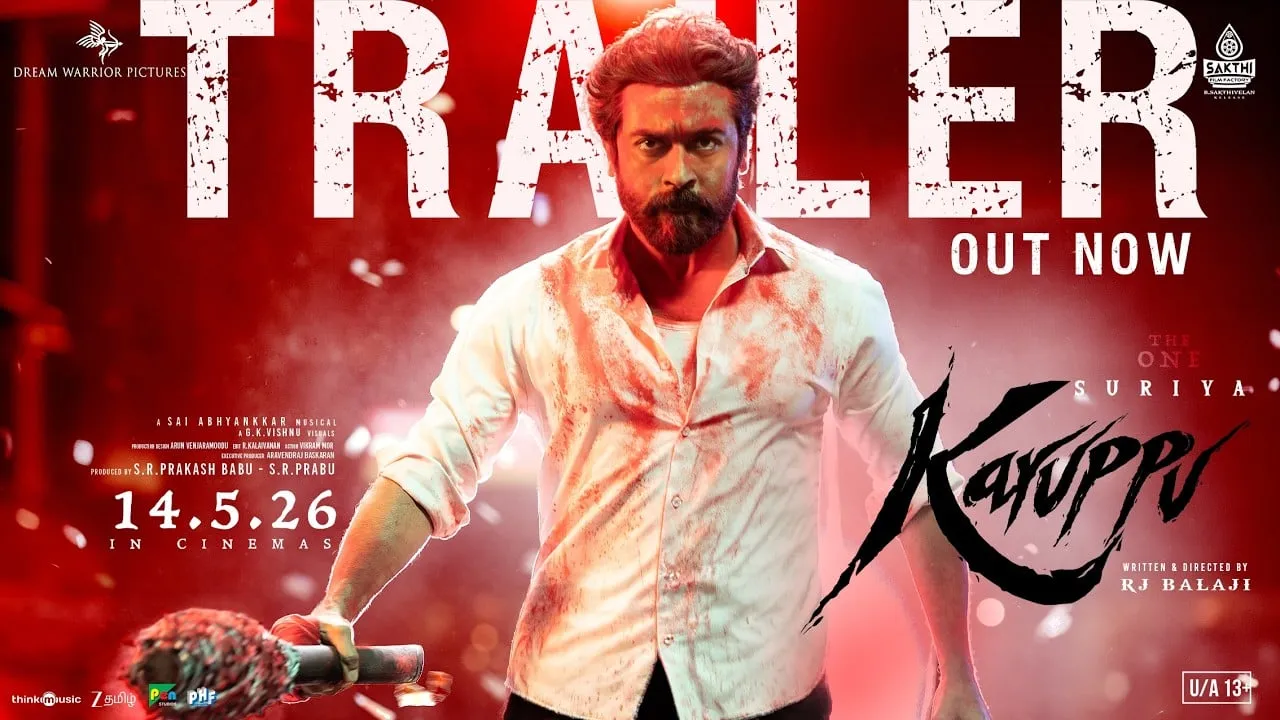 Suriya as Karuppasamy on the Karuppu trailer key art, holding a bloodied aruval in a torn white shirt against a red background, with 14.5.26 release date marked
