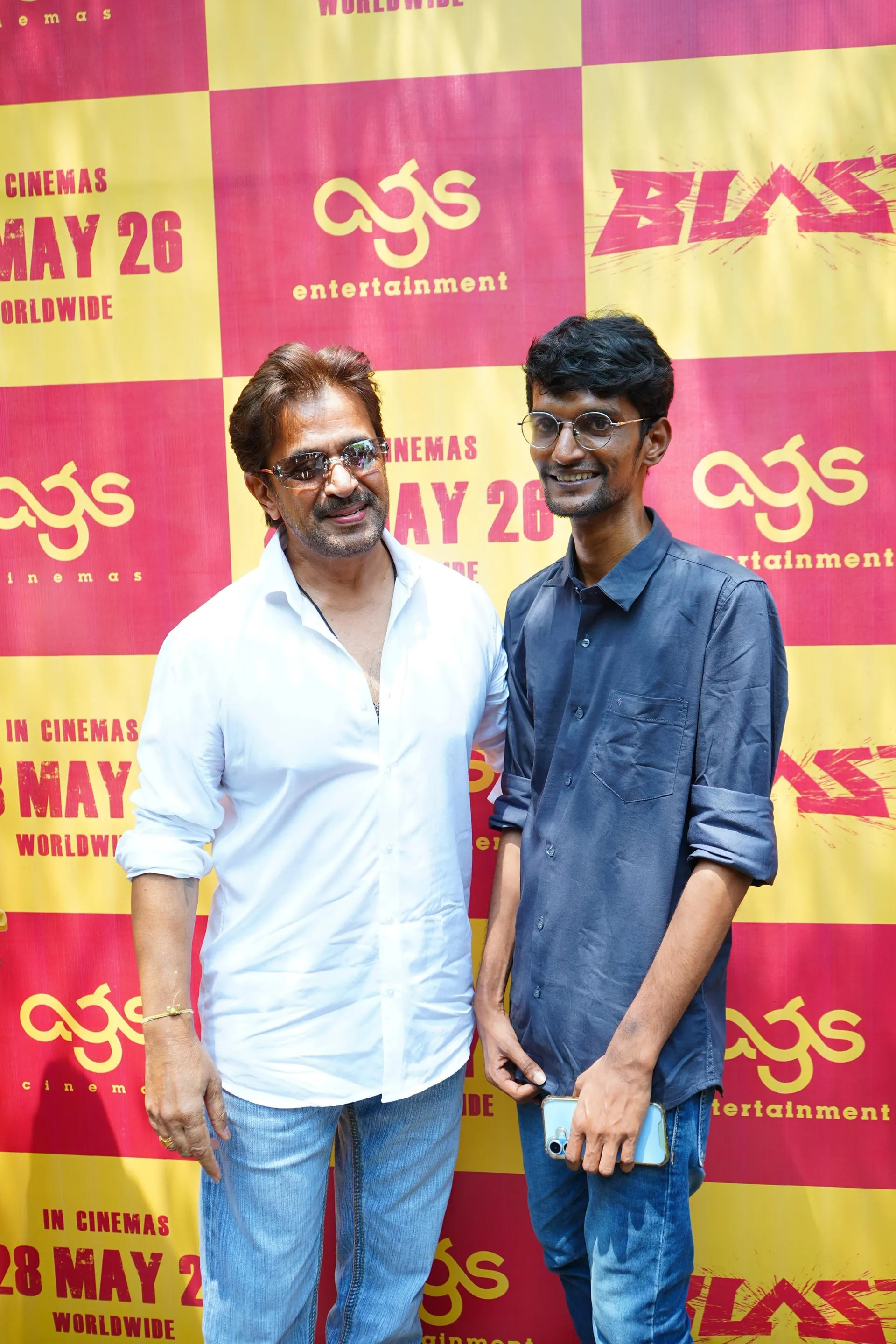 Action King Arjun and debut director Subash K Raj on the AGS step-and-repeat at Monday's Blast pre-release event in Chennai