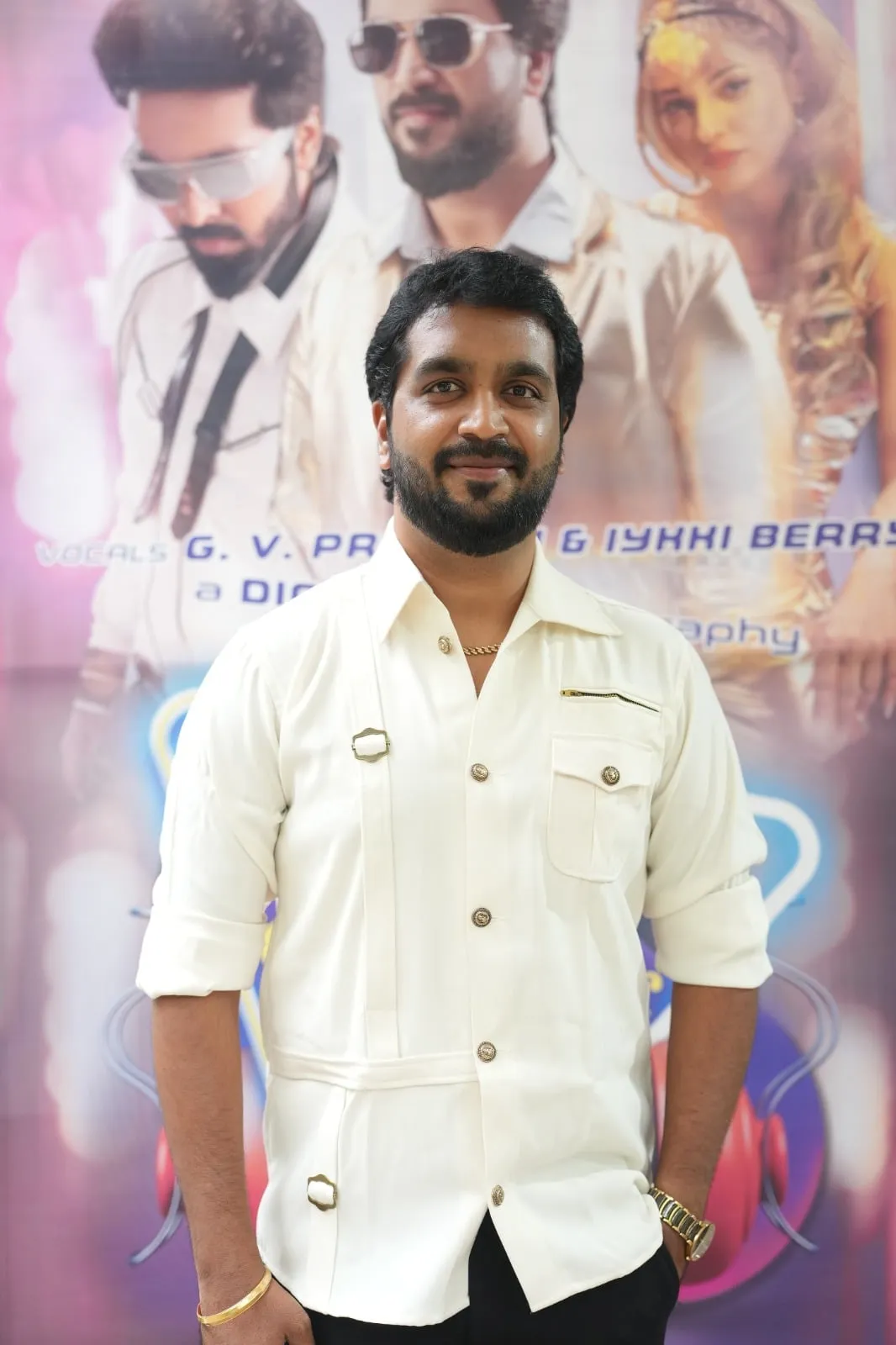 Balaram J. Balaji, in white, between two members of the Silent Influencer crew outside the launch venue.