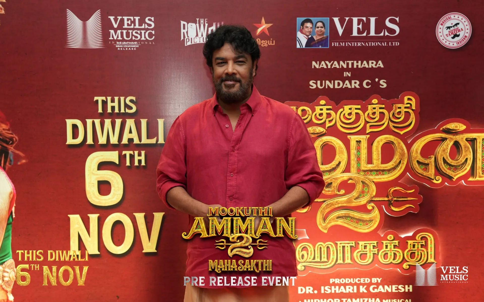 Guest on the red carpet at the Mookuthi Amman 2 pre-release event
