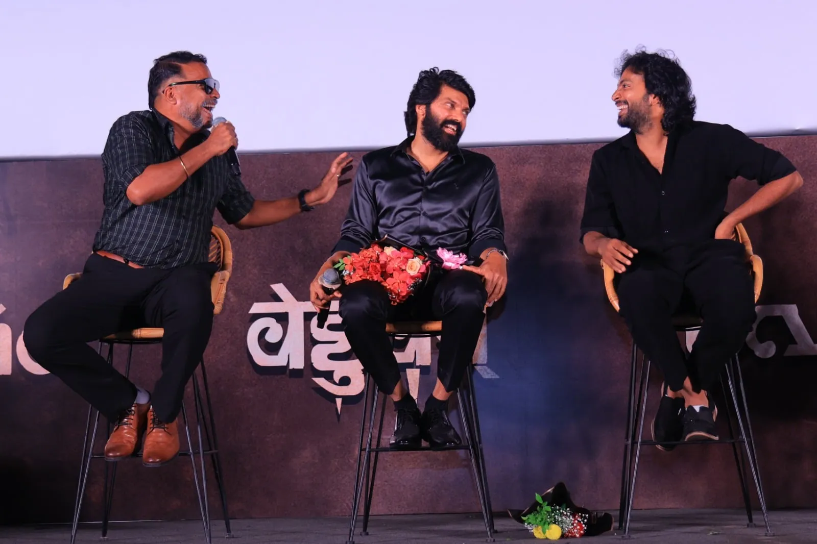 The Vettuvam team discusses the film onstage during the presentation