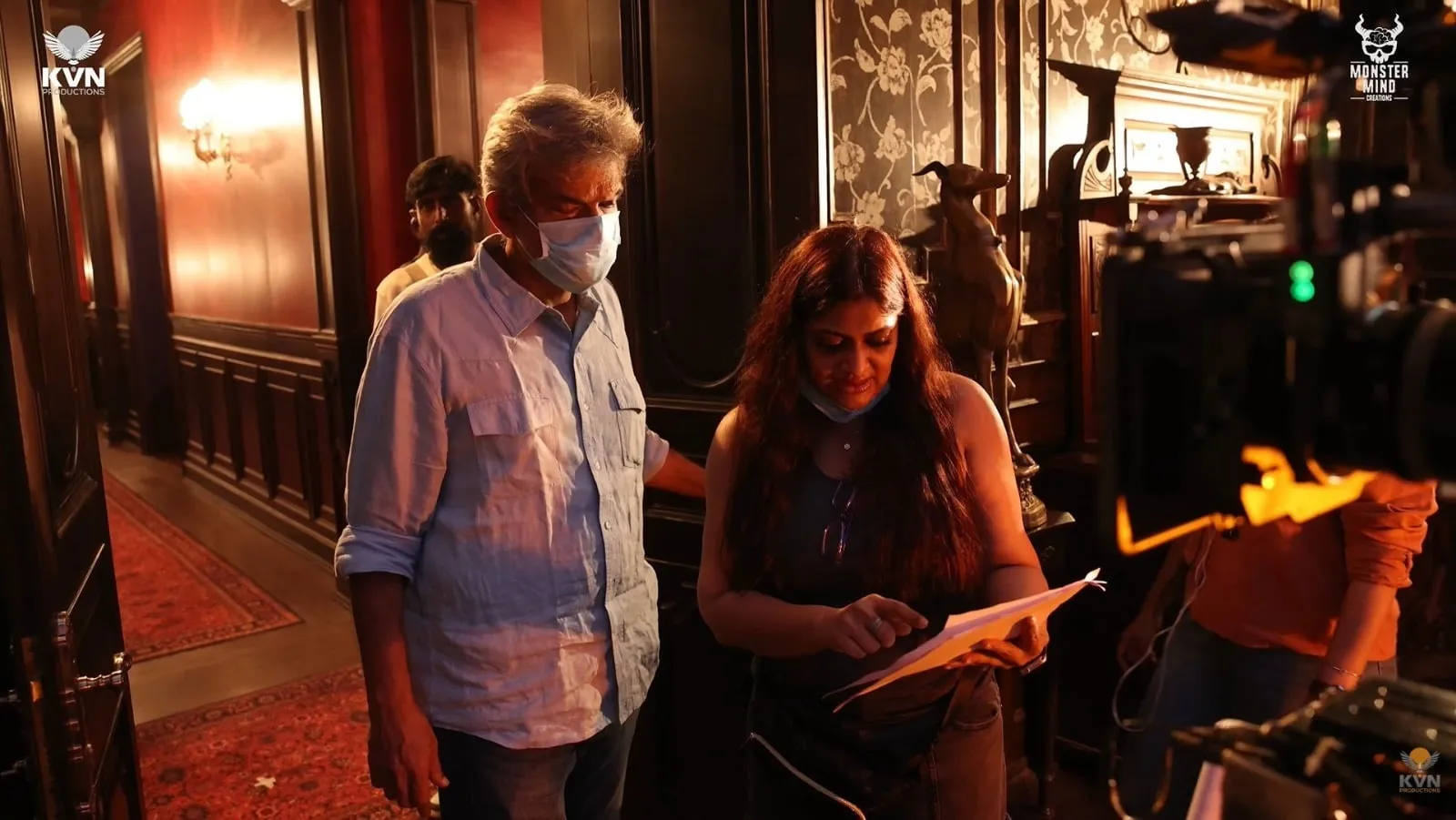 Geetu Mohandas reviewing the day's pages on the set of Toxic
