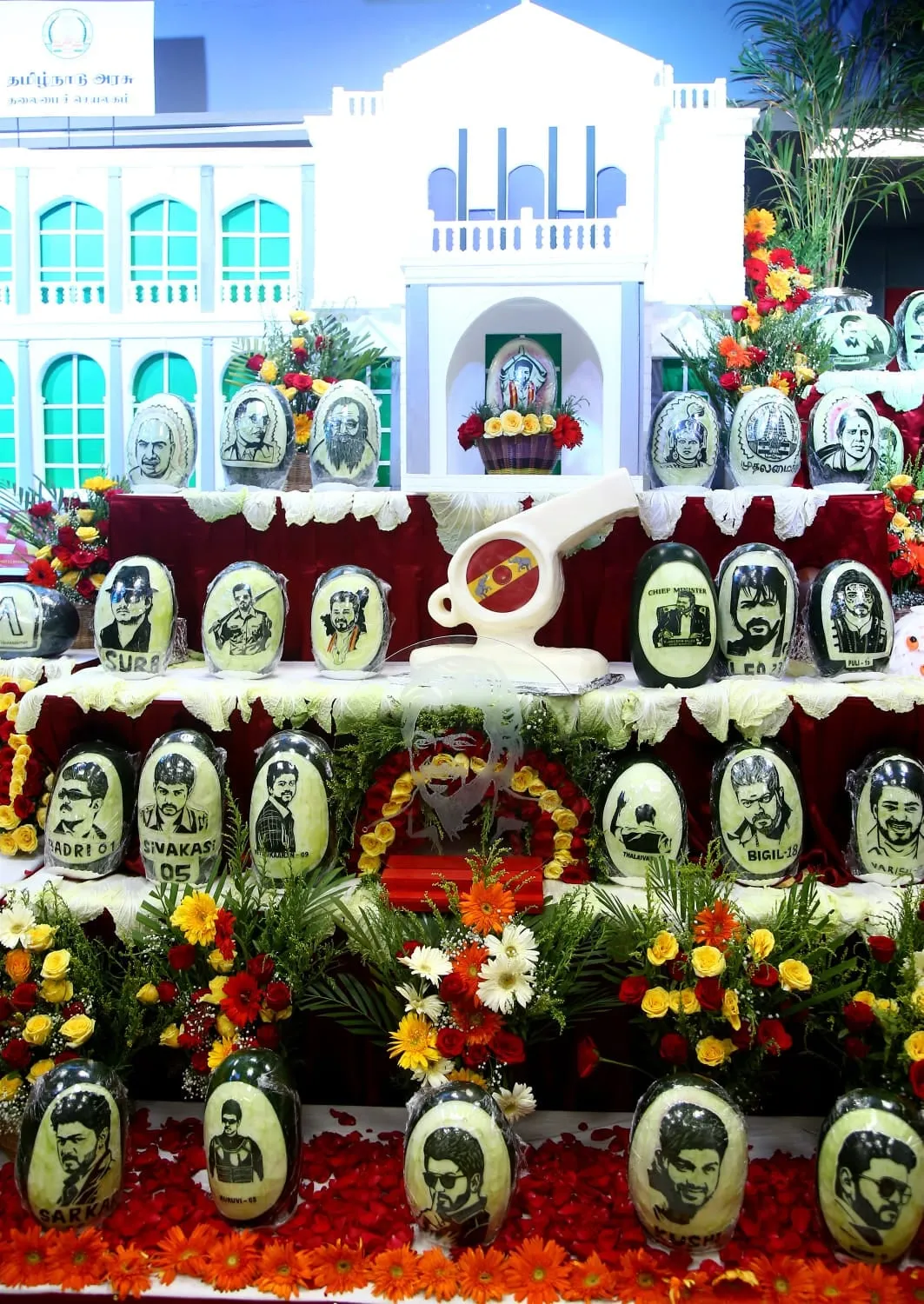 The carvings climb a painted facade in tiers, sixty-nine of them in all.