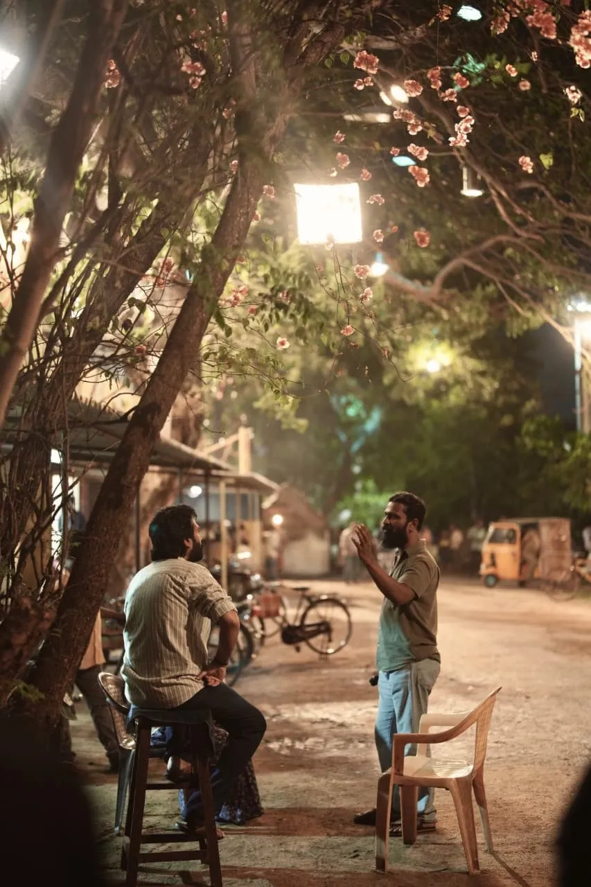 Vetrimaaran talks through a scene with Silambarasan TR on the recreated North Chennai street set.