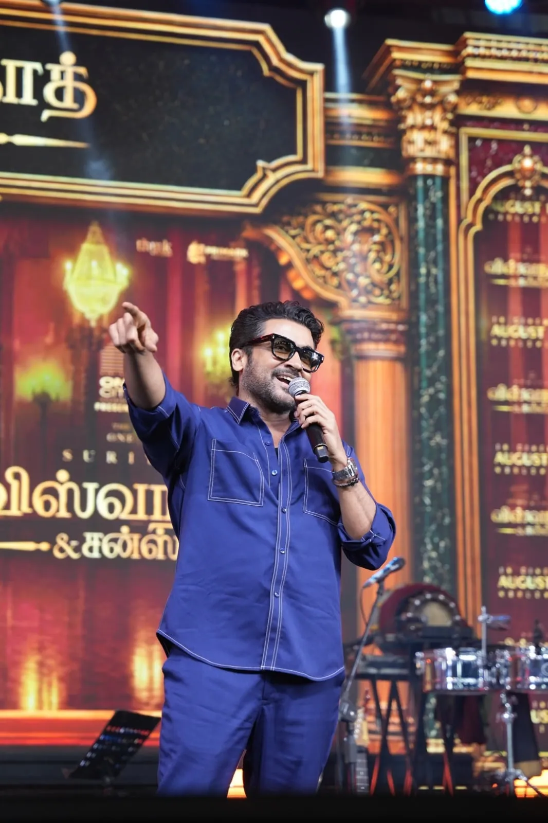 Suriya on stage at the Vishwanath & Sons audio launch in Coimbatore