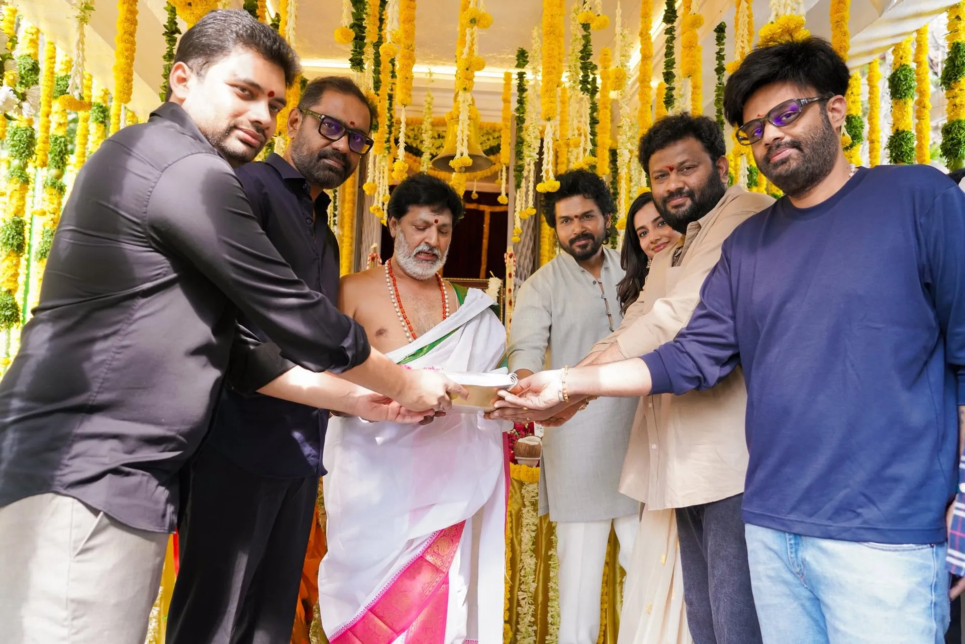 Karthi and the team at the launch pooja, where the project was formally set rolling.