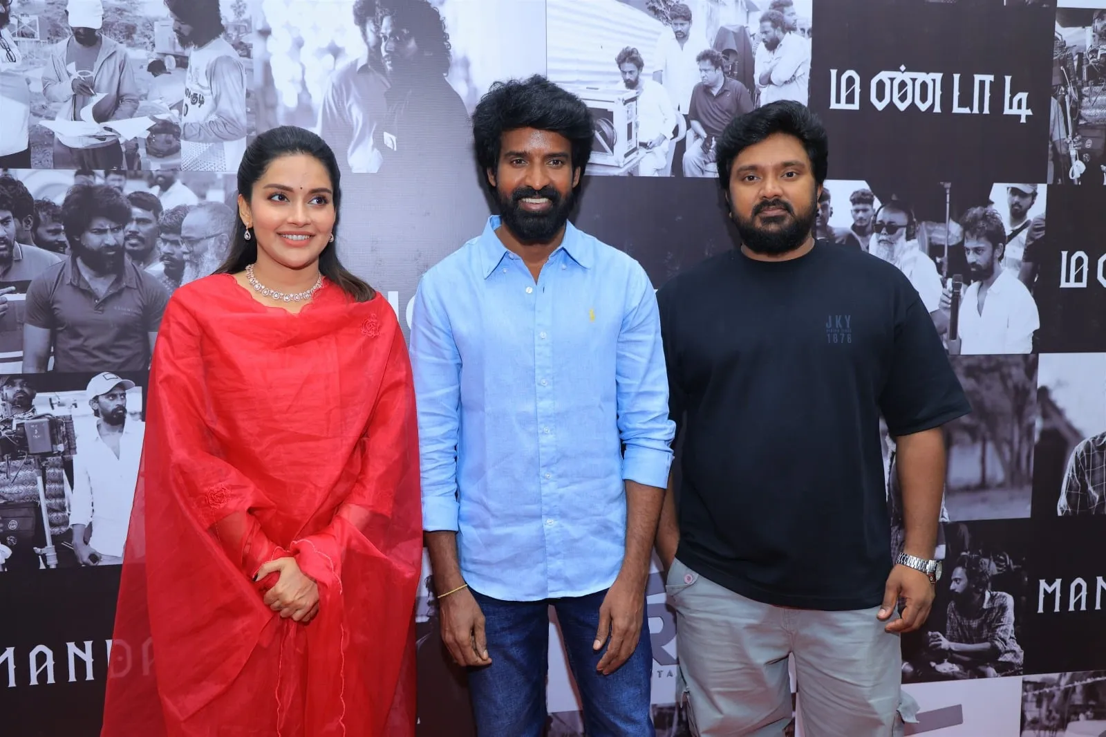Mahima Nambiar and Soori pose together with a Mandaadi colleague at the success meet
