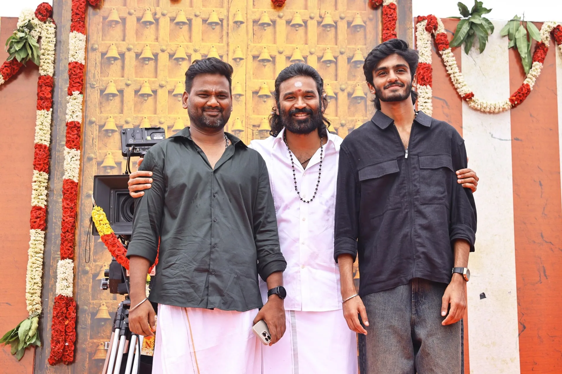 Dhanush with members of the D56 team at the pooja