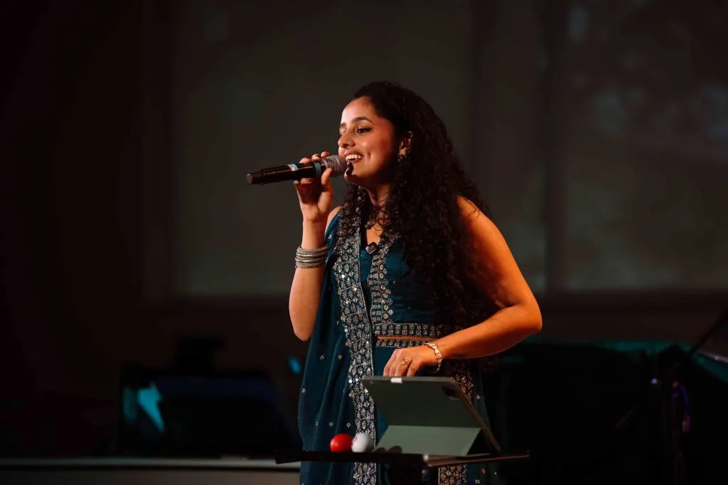 On stage during one of the live shows that have stayed the centre of her work even as recordings stack up.
