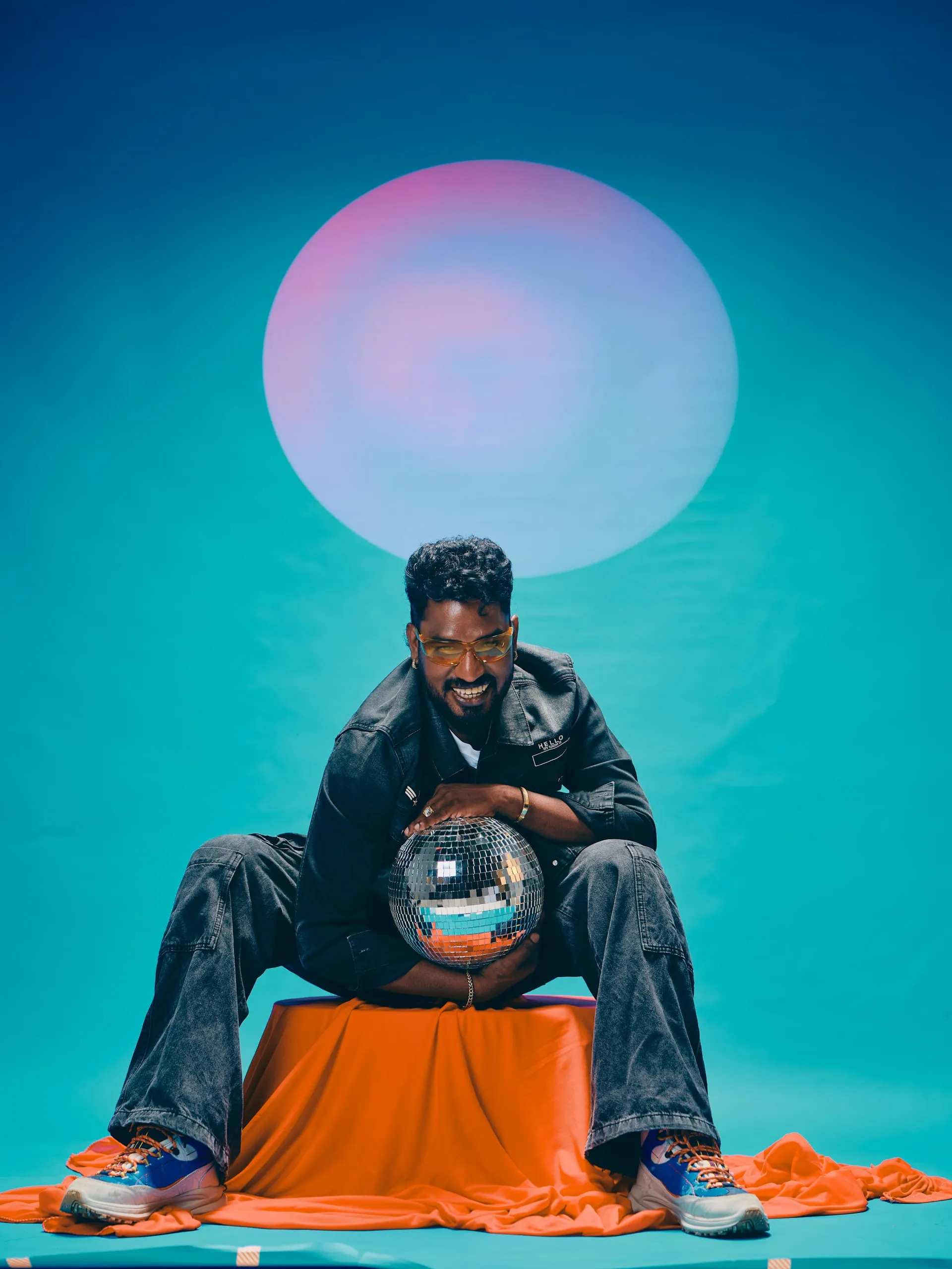 Mannar Muthu holding a disco ball
