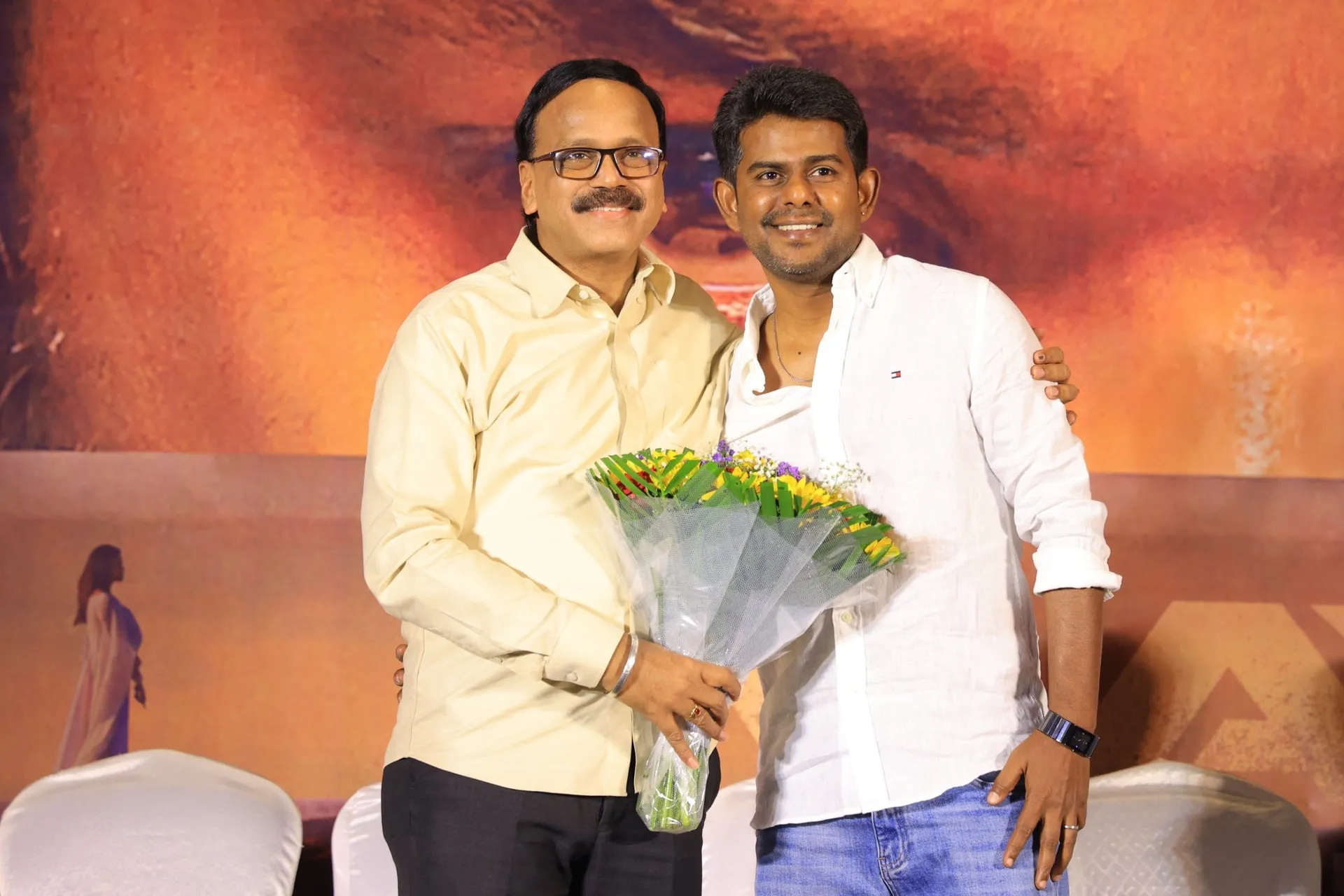 Producer Dhananjayan with Babu Vijay; Dhananjayan drew the Joseph Vijay parallel on stage.
