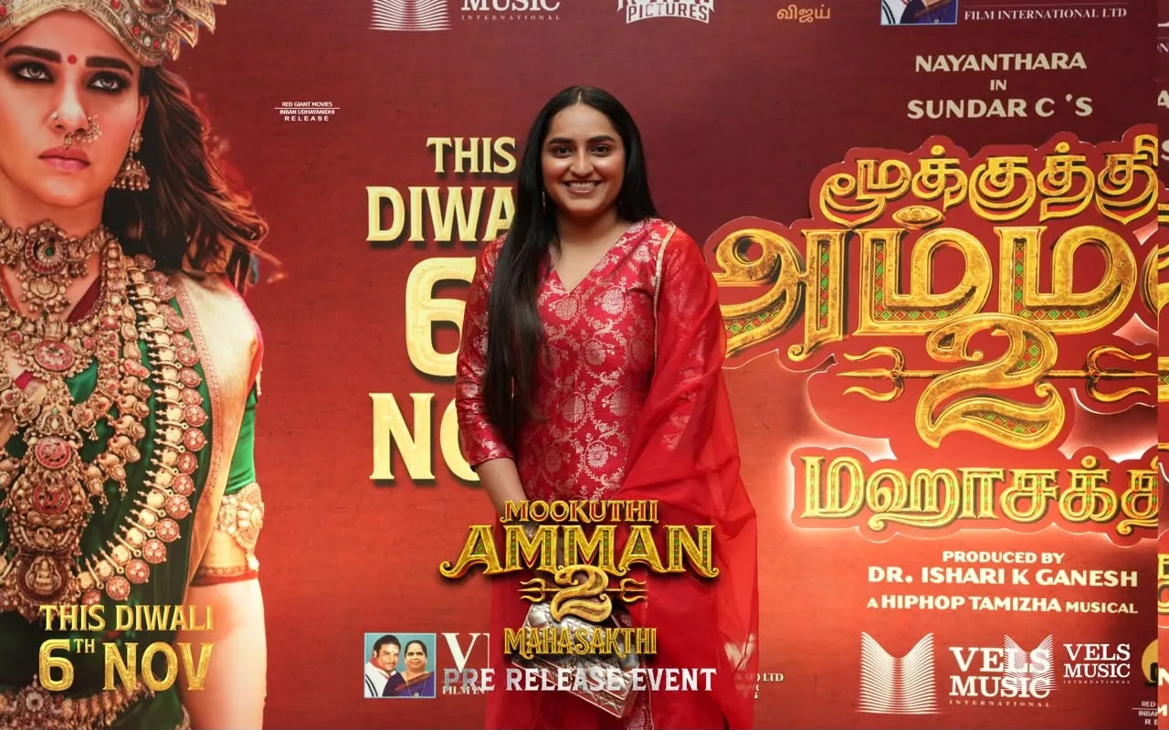 Guest on the red carpet at the Mookuthi Amman 2 pre-release event