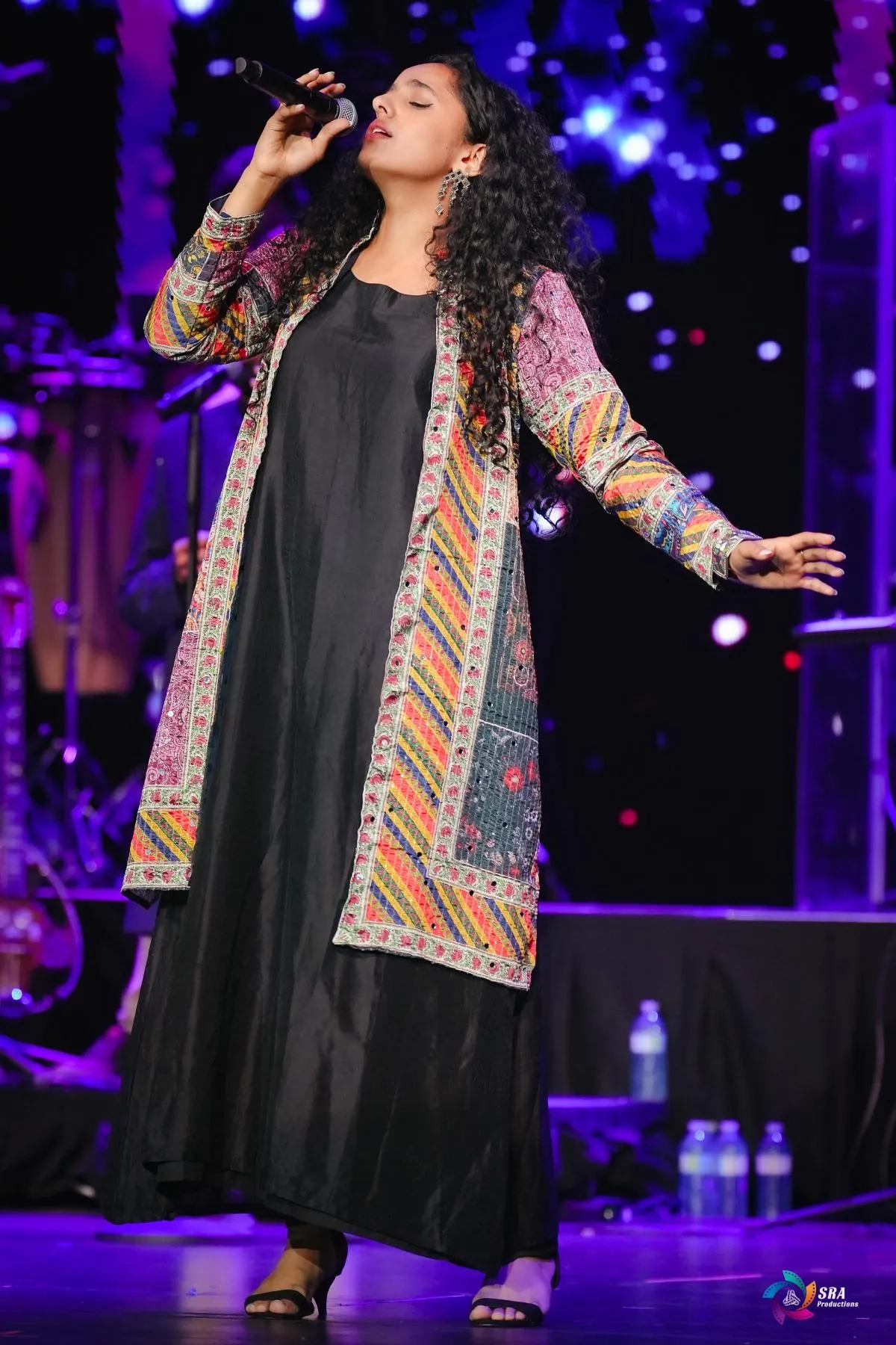 Performing live with the Berklee Indian Ensemble, the Grammy-nominated outfit she sings lead for.