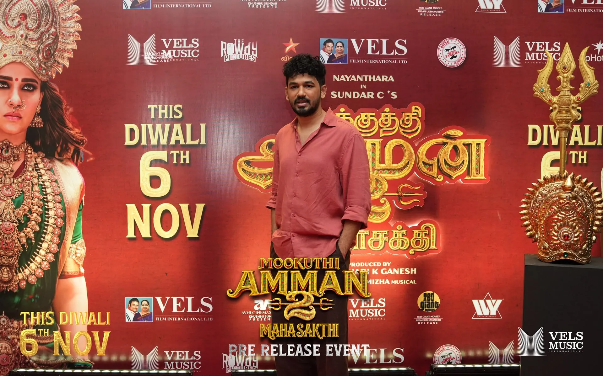 Guest on the red carpet at the Mookuthi Amman 2 pre-release event