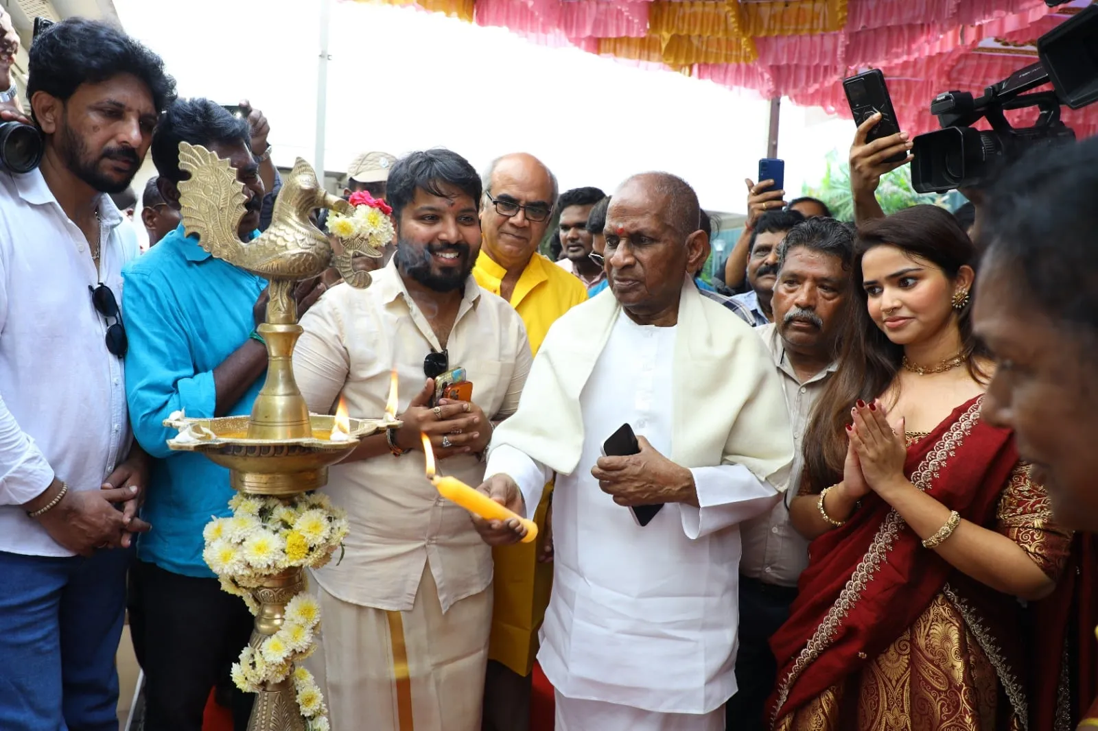 The ceremonial lamp was lit to mark the launch of Iravanan Solaiyil Sivan Malai on September 14.