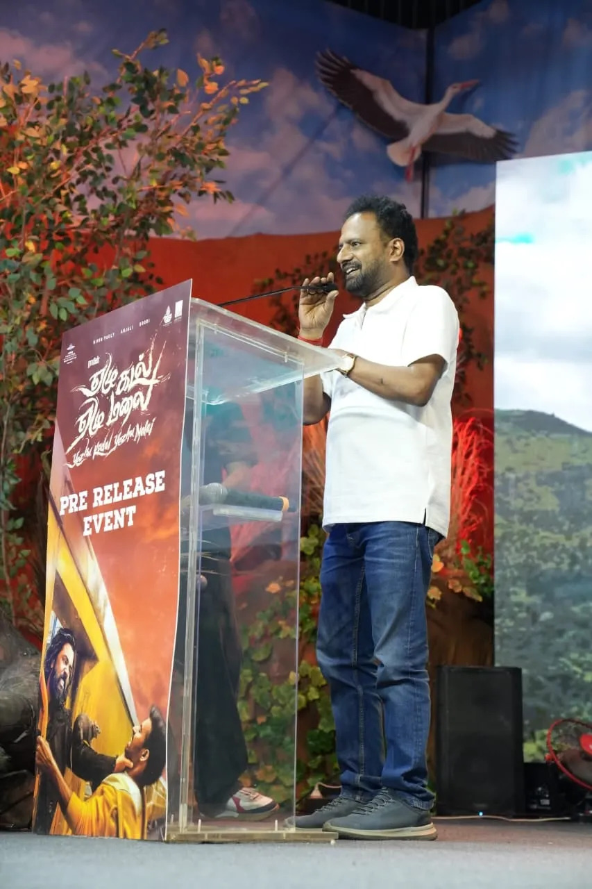 A speaker shares his remarks at the pre-release event