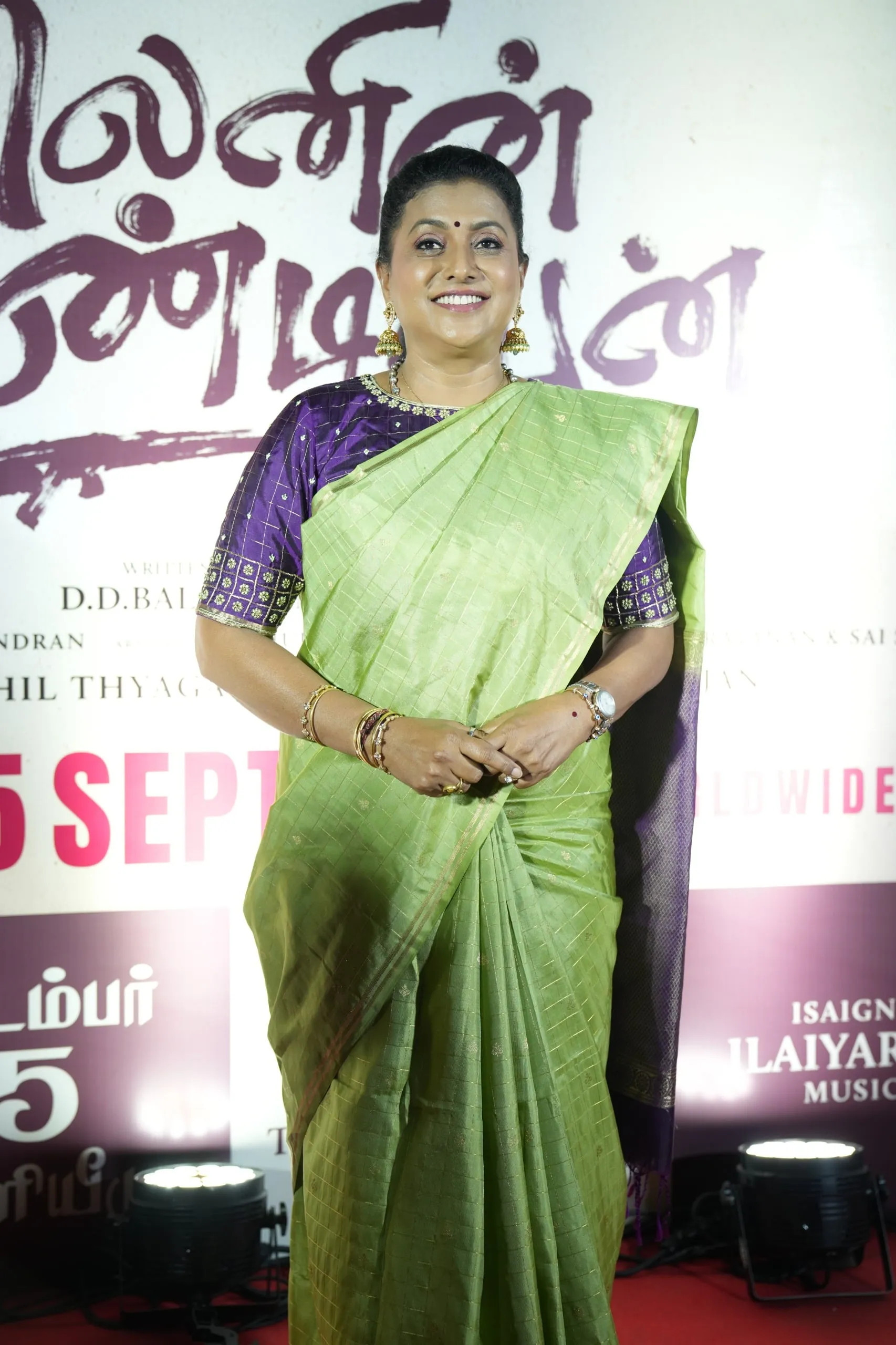 Portrait in a green sari at the Lenin Pandiyan gathering