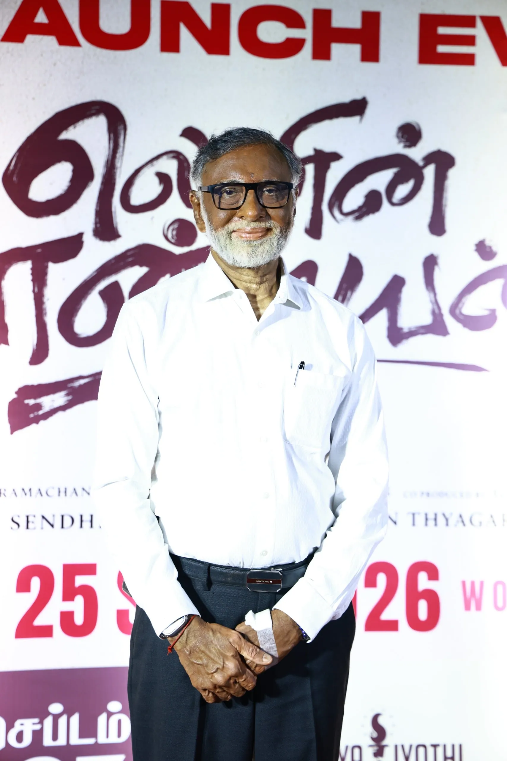 Portrait in a white shirt at the Lenin Pandiyan gathering