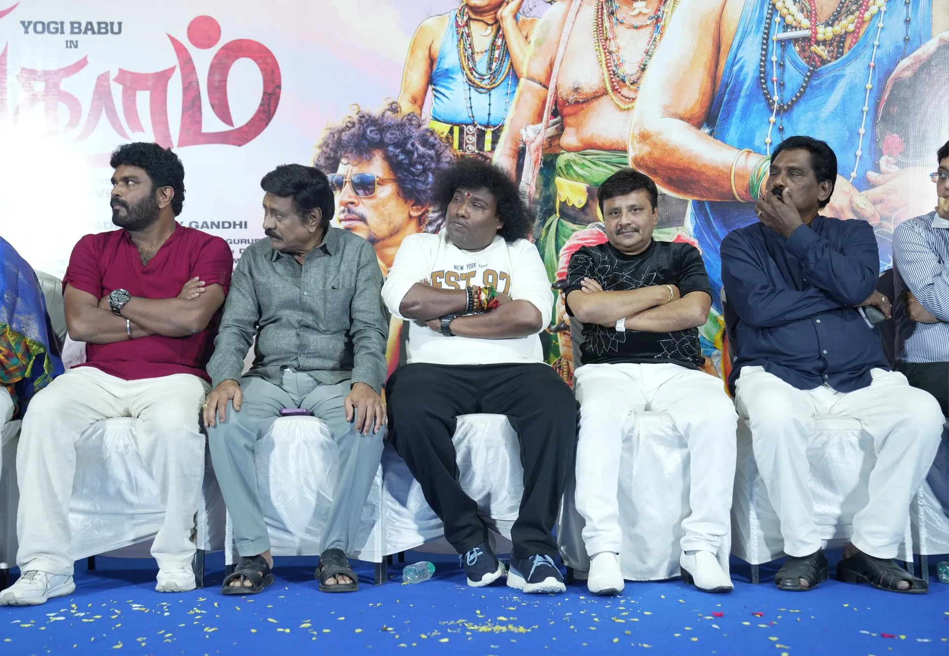 The team shares the stage as Singgaramm's cast and crew discuss the film's journey.